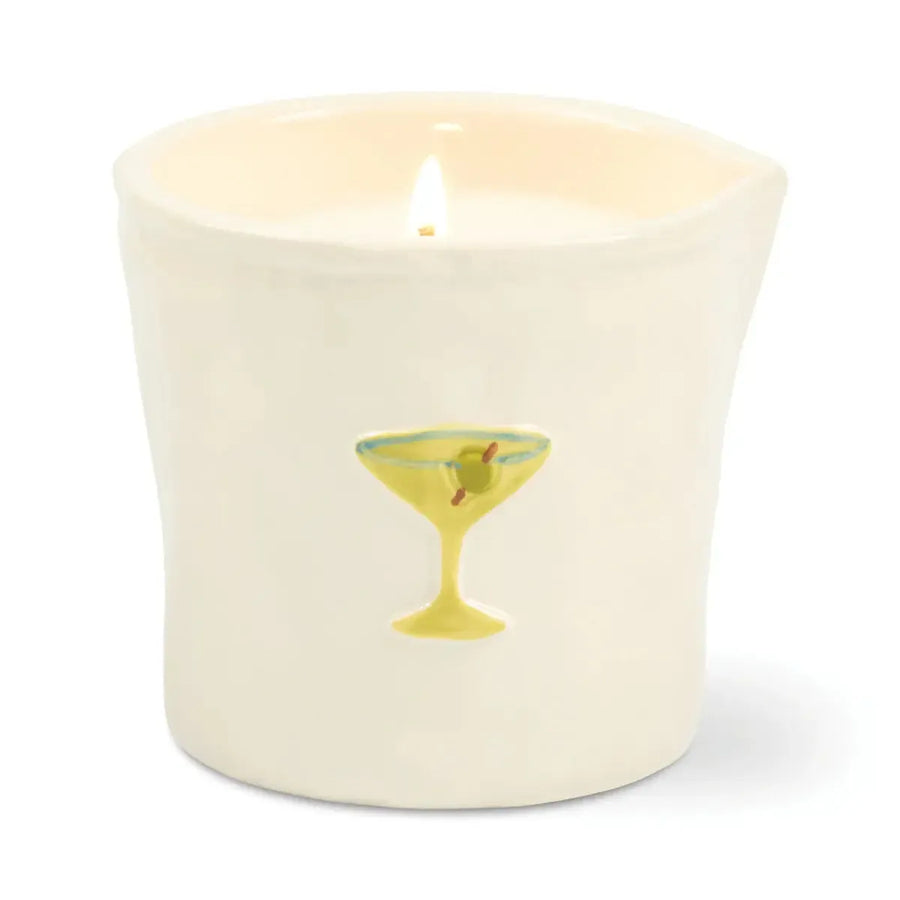 Candle in a decorative pink box with 'Martini' text and cocktail illustrations on a white background.