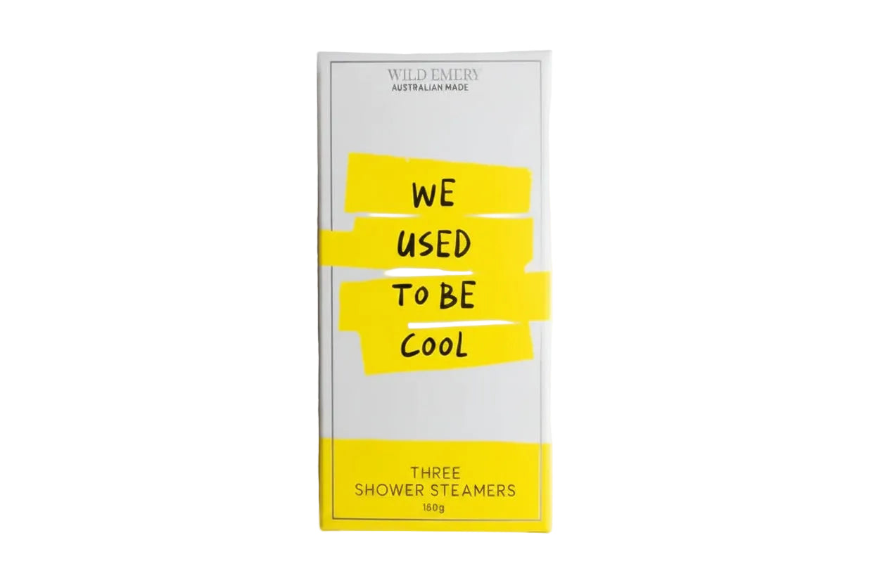 Box of Wild Emery shower steamers with yellow and black text on a white background